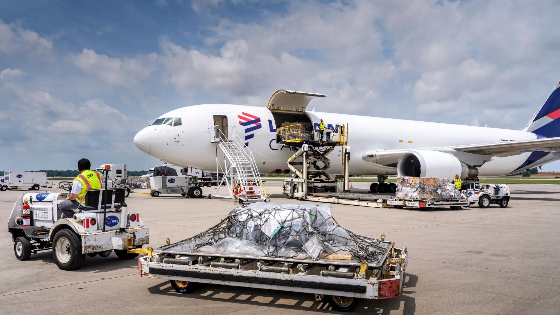 Wide-body freighter aircraft at MIA's cargo apron — one of more than thirty-five all-cargo carriers operating scheduled or charter freighter service from Miami to Latin America, Europe, Asia, and the Caribbean.