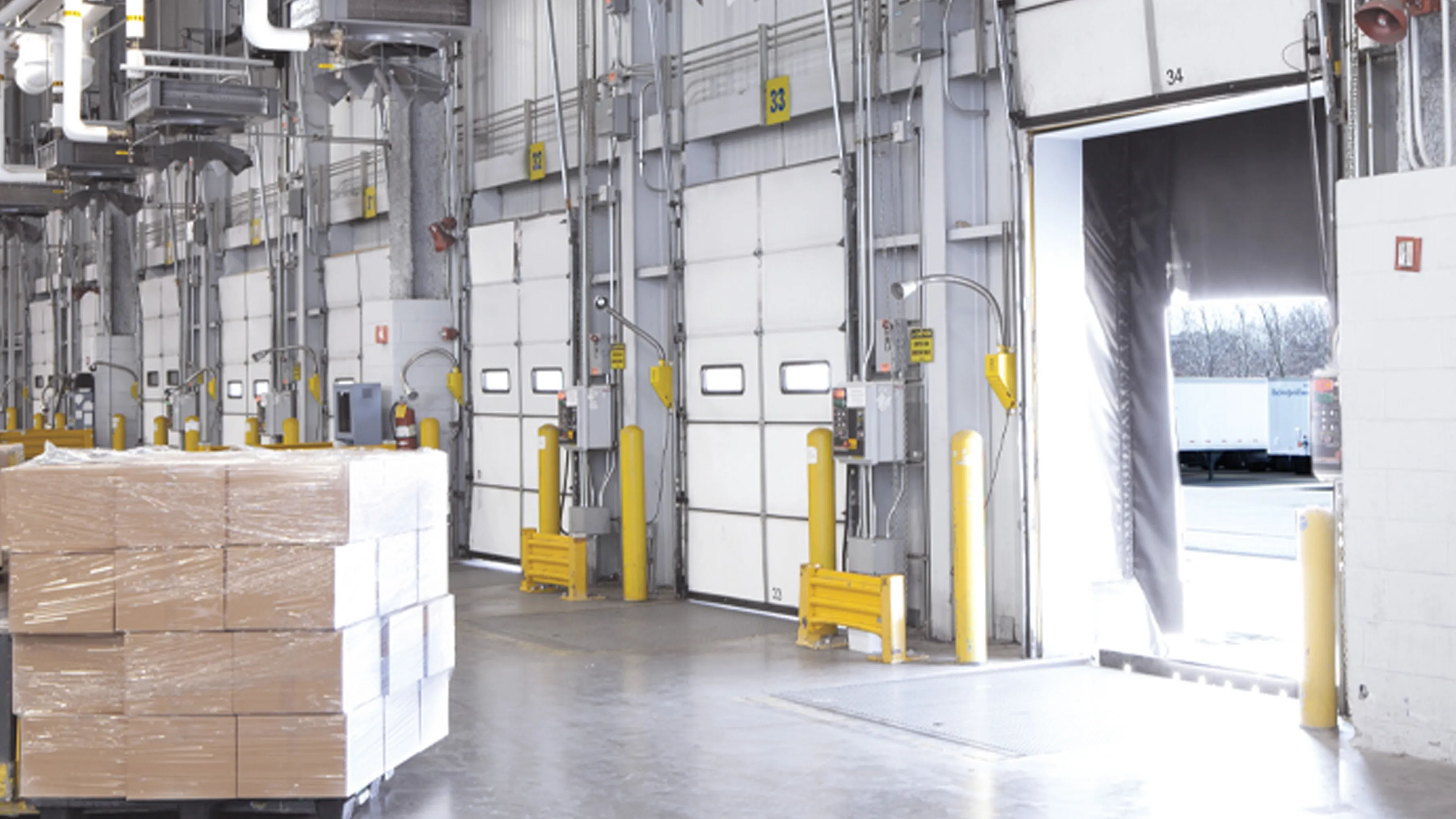 Drayage in motion — a container chassis on the South Florida road network, en route between the corridor gateways and the warehouse anchor at Pompano Beach.